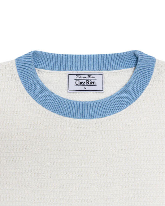 Close up of the collar on Chez Rien’s Bone Textured Ringer Tee