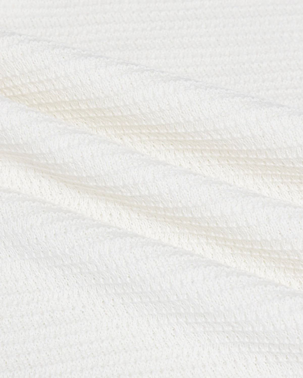 Close up of the fabric used for Chez Rien’s Textured Ringer Tee in Bone