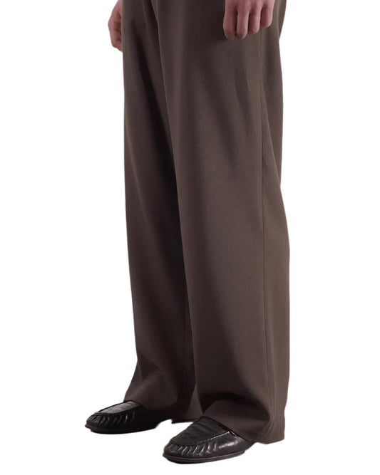 3/4 Side of Walnut Lewis Trousers worn by a model on a white background 