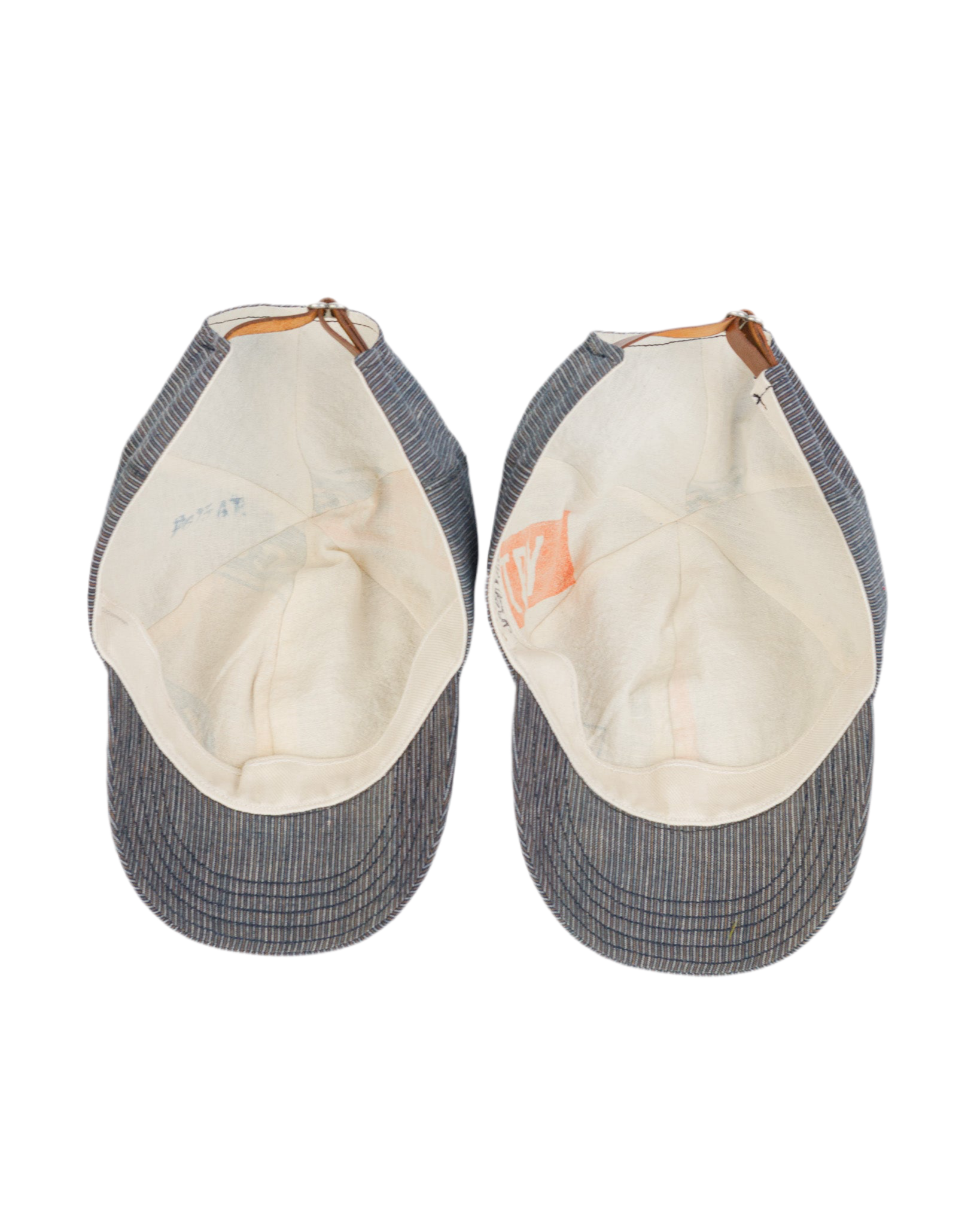 The inside of 2 Object From Nothing Blue Thin Stripe Warden Caps on a white background